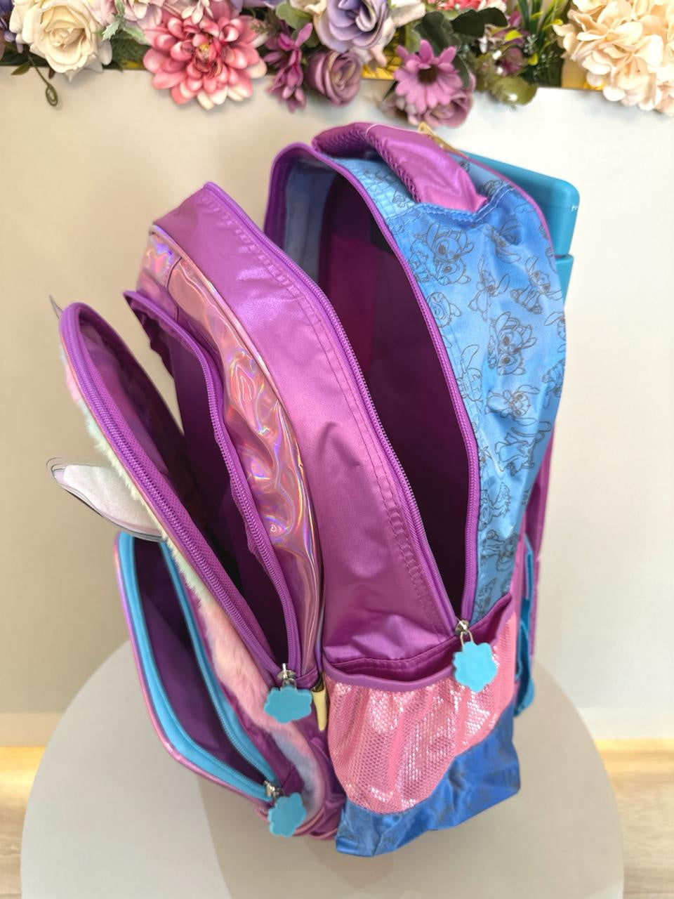 Kit Infantil Mochila rodinhas + Estojo do Lilo Stitch e Angel Roxo