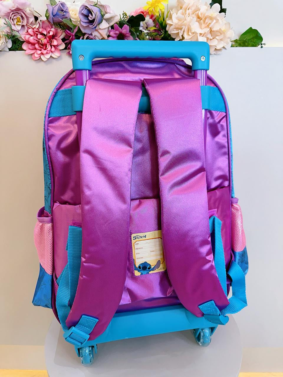 Kit Infantil Mochila rodinhas + Estojo do Lilo Stitch e Angel Roxo